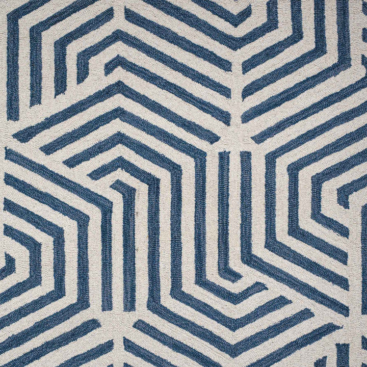 BLUE IVORY BESPOKE HAND TUFTED CARPET