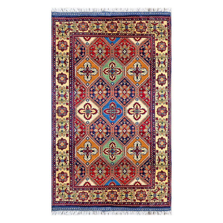Afghan Herat Turkmen Chobrang hand-knotted carpet, warm ivory ground with allover interlocking diamond lattice in amber, bottle green, navy and deep crimson