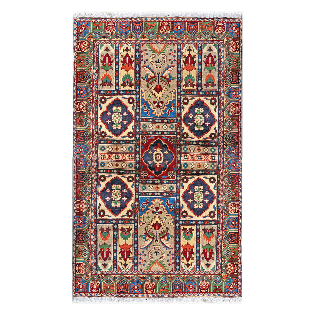Afghan Herat Turkmen Chobrang hand-knotted carpet, compartmentalised garden composition on ivory ground with crimson, blue and sage-green panels, deep green border