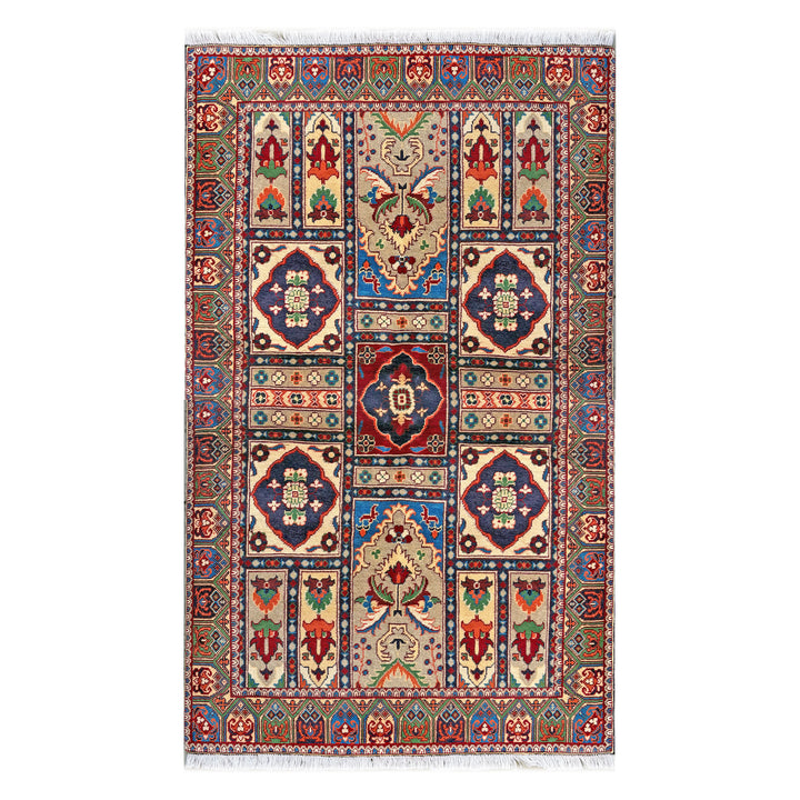 Afghan Herat Turkmen Chobrang hand-knotted carpet, compartmentalised garden composition on ivory ground with crimson, blue and sage-green panels, deep green border