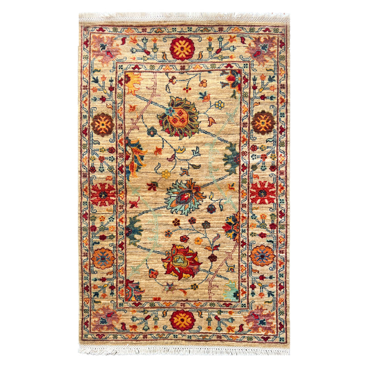 Afghan Kabul Hazara Chobi hand-knotted carpet, warm ivory parchment field with three large flowering forms on curling vines in red, teal and amber, deep red border