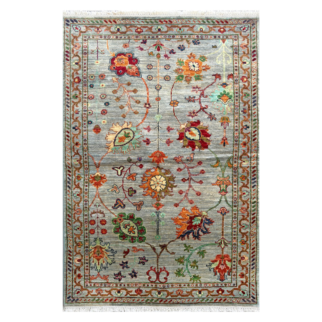 Afghan Kabul Hazara Chobi hand-knotted carpet, soft silver-sage field with allover botanical vine in saffron and orange blooms, caramel-gold border