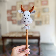 Cow on stick