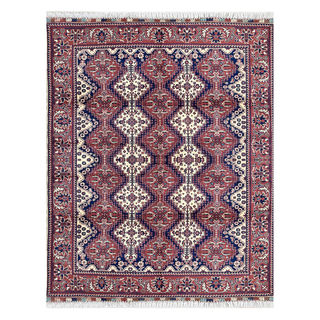 Afghan Mazar-e-Sharif Turkmen Yusufi hand-knotted carpet, deep indigo navy field with large central ivory medallion and four corner medallions, warm dusky rose border