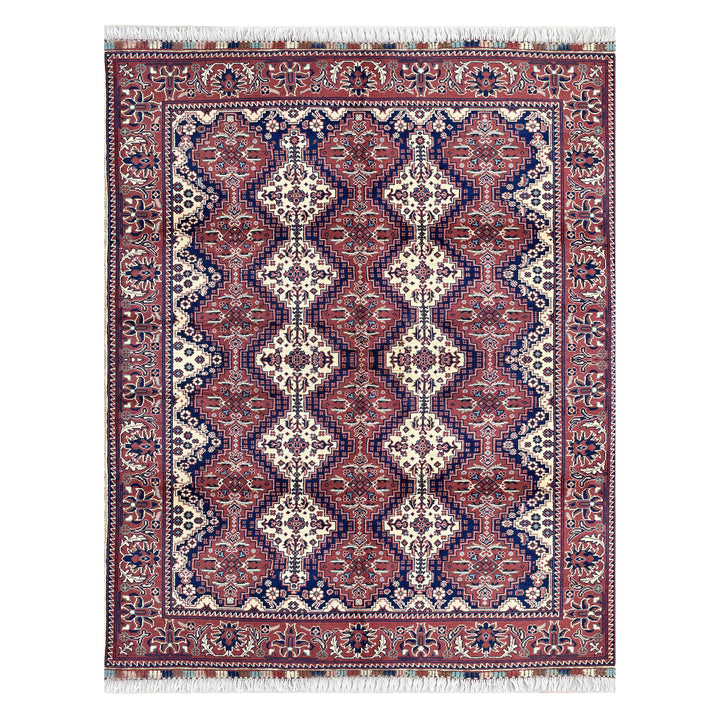 Afghan Mazar-e-Sharif Turkmen Yusufi hand-knotted carpet, deep indigo navy field with large central ivory medallion and four corner medallions, warm dusky rose border