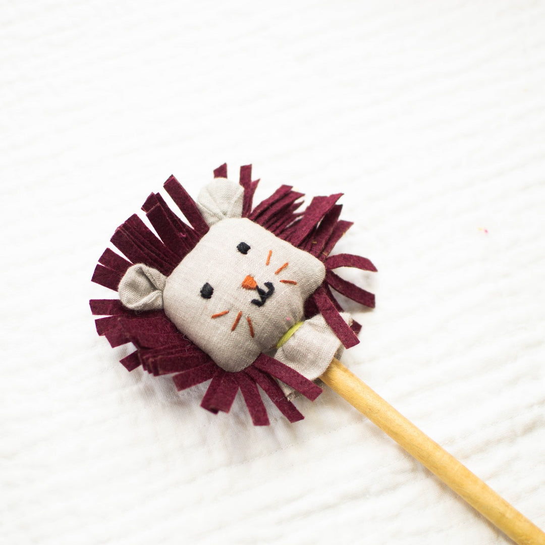 Lion on stick