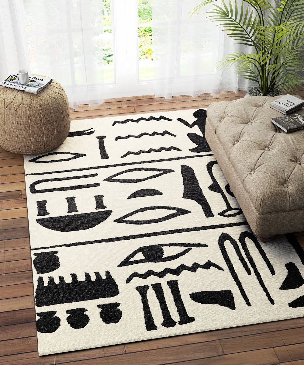 BLACK AND IVORY TRIBAL CARPET