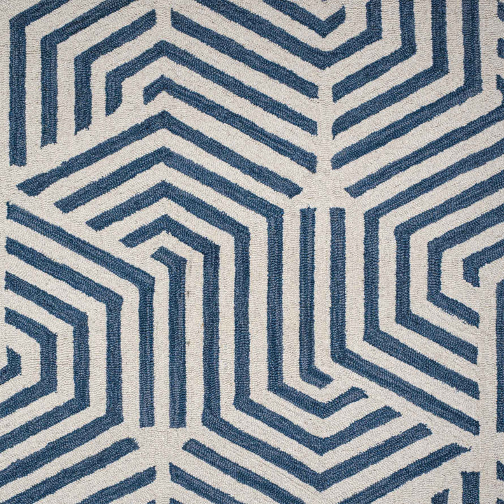 BLUE IVORY BESPOKE HAND TUFTED CARPET