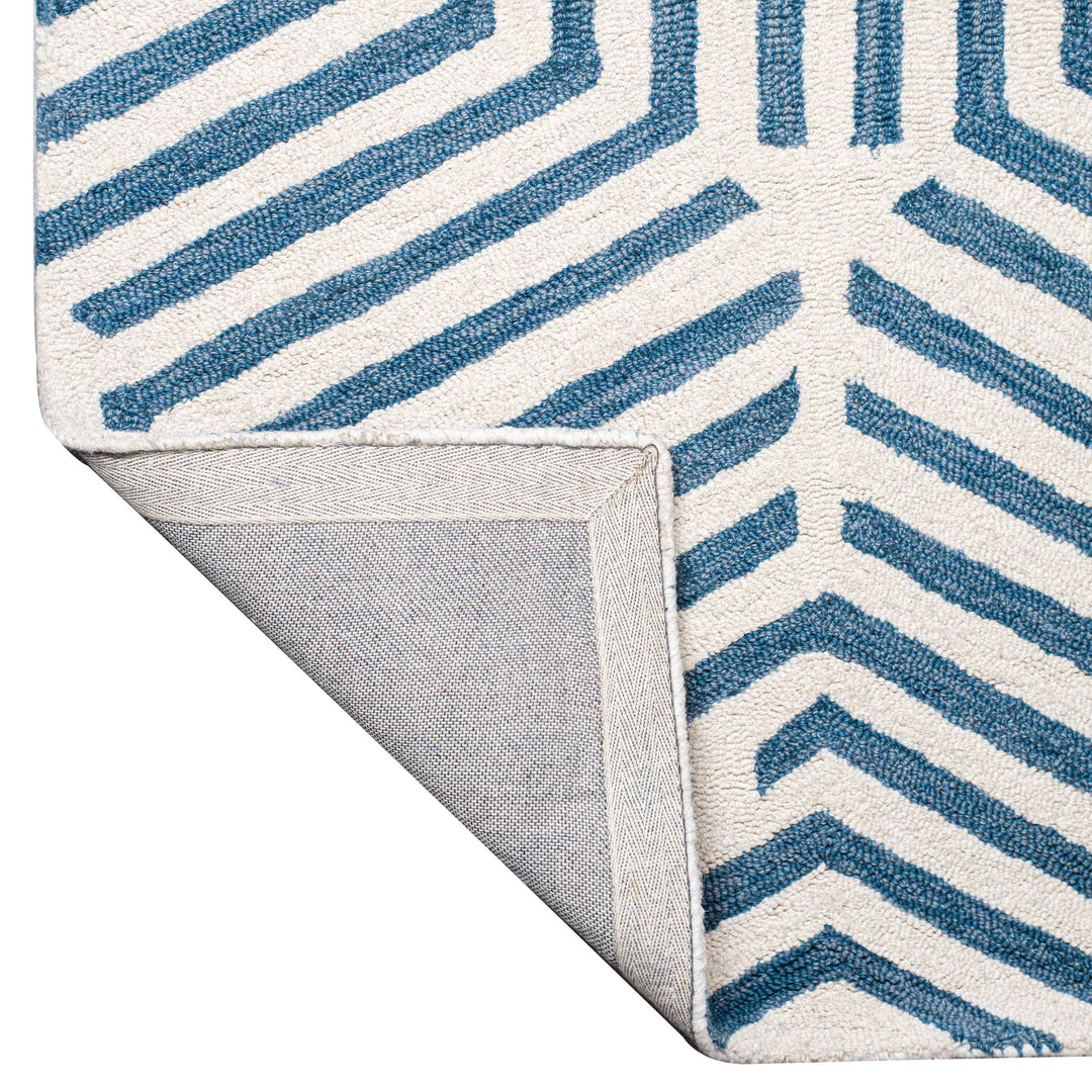 BLUE IVORY BESPOKE HAND TUFTED CARPET