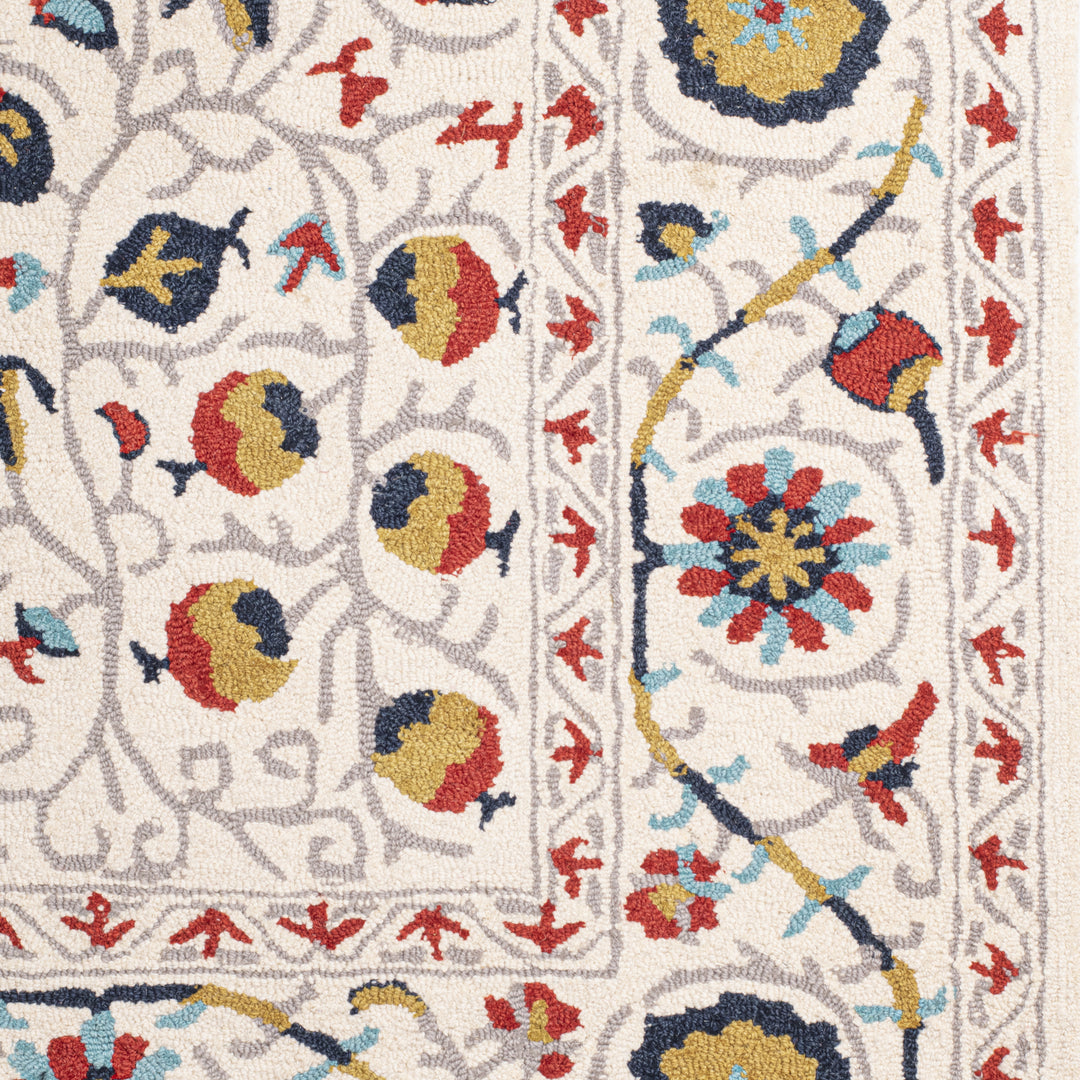 IVORY SUZANI HAND TUFTED CARPET