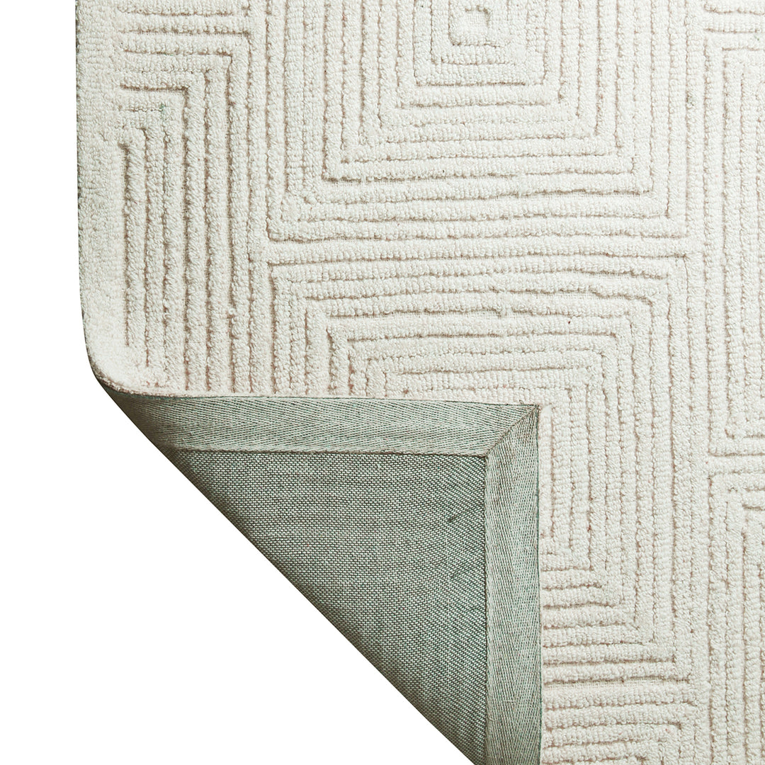 IVORY GEOMETRIC HAND TUFTED CARPET